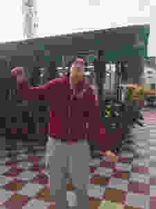 Dancing man on rooftop.