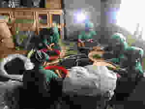 Hand grading tea, Ilam, Nepal