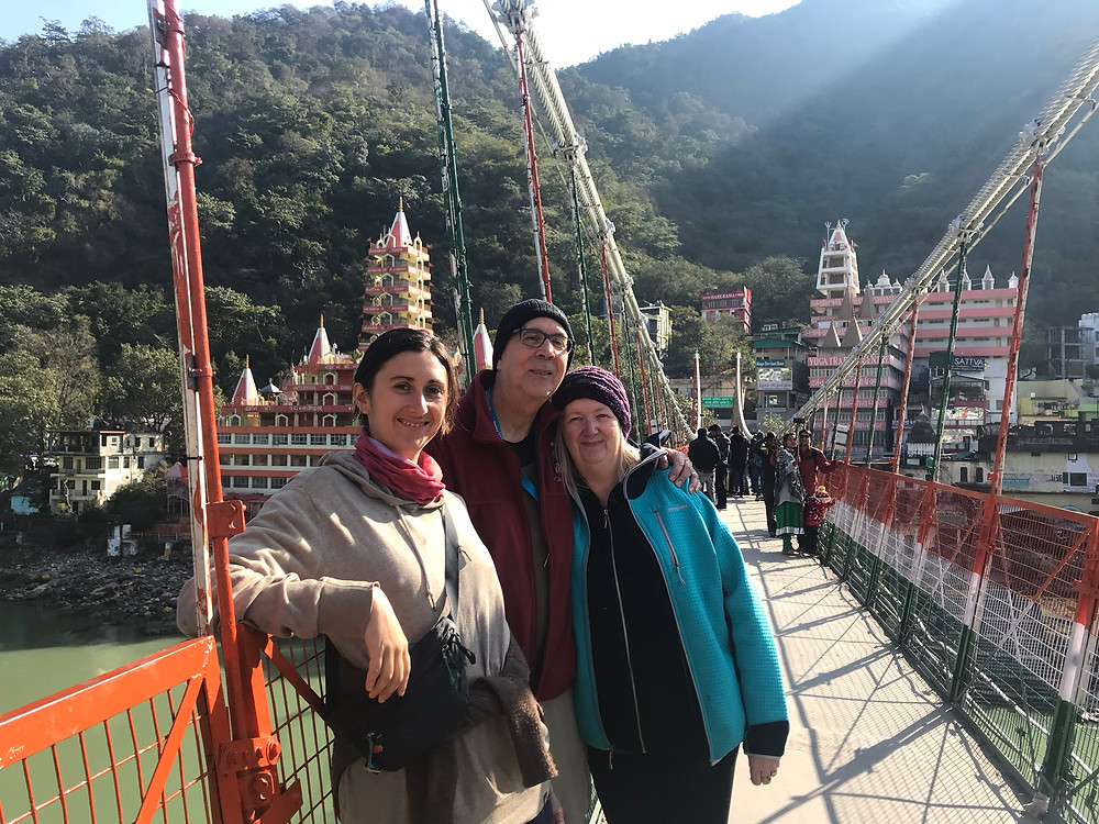 Family posing on the bridge in Rishikesh, India.