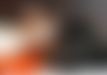 Cats grooming each other.