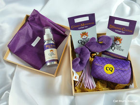 A box of Catnip Queen soft cat toys and catnip spray.