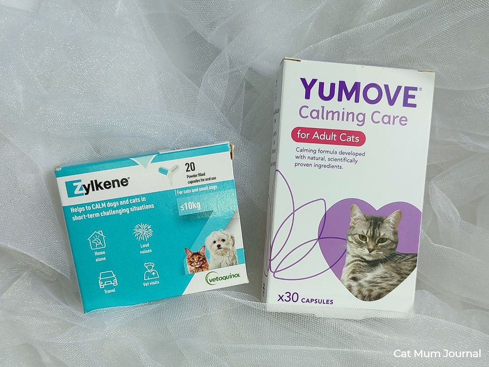 Boxes of Zylkene and YuMOVE Calming Care capsules on a white gauze background.