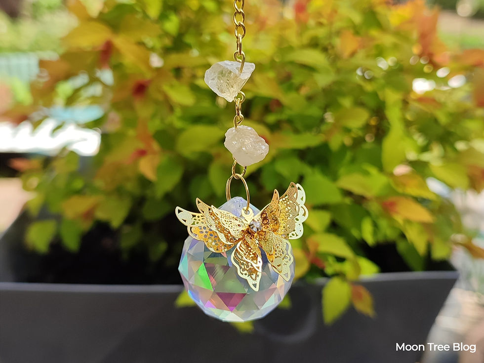 Crystal Suncatcher with butterfly and citrine.
