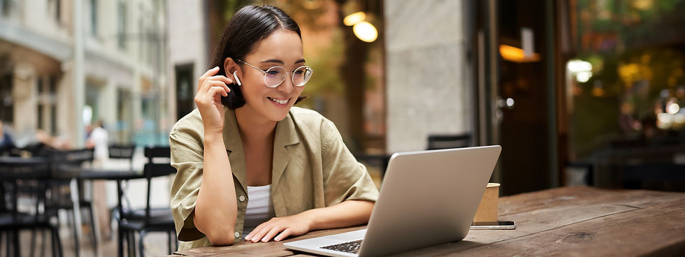 portrait-asian-girl-works-cafe-uses-laptop-sits-outdoors-street-digital-nomad.jpg