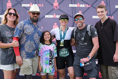 Heidi and her family after participating in Ironman