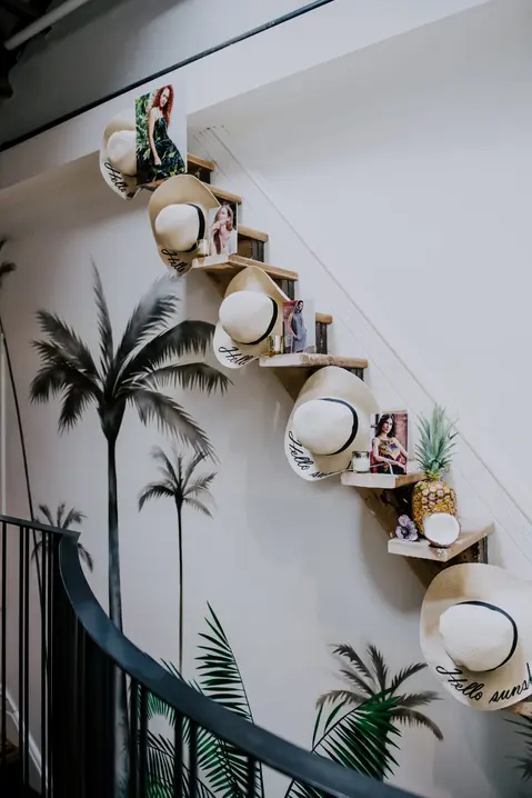 Row of sunhats on display for brand activation