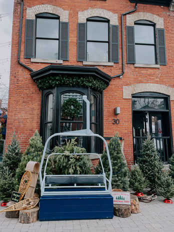 Blue custom-built ski-lift on a Hamilton bar exterior for photo-opps.