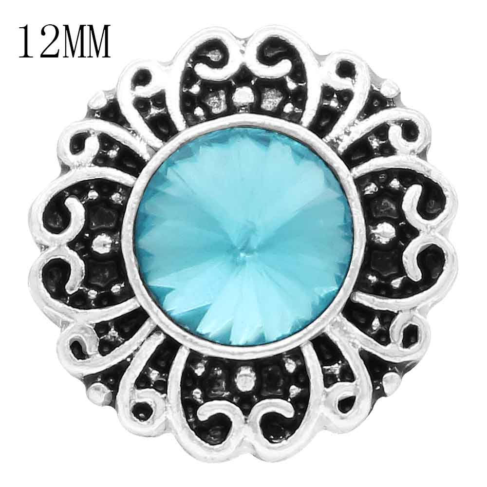12mm Turquoise Center Stone Surrounded By Scrolling Snap (12~6387)