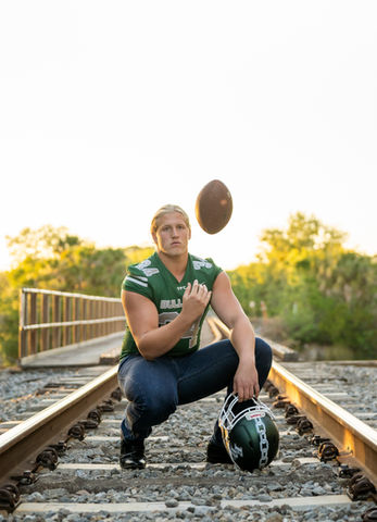 Senior photos of boy at Flagler Palm Coast High School