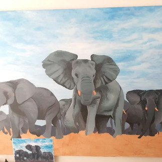 Process of Sophie Parkhill painting "A Long Road Home" a herd of elephants which has since sold, donating money to Tsavo Trust.