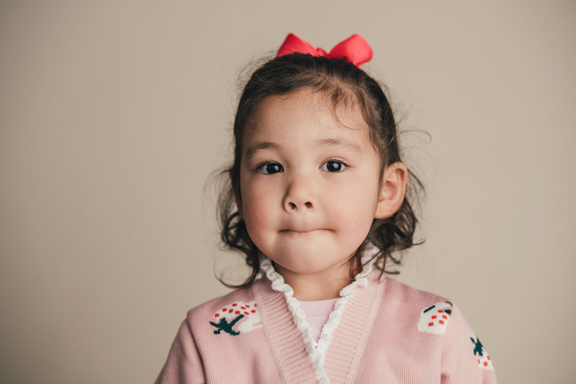 Young girl with a quiet expression during a fine art school portrait
