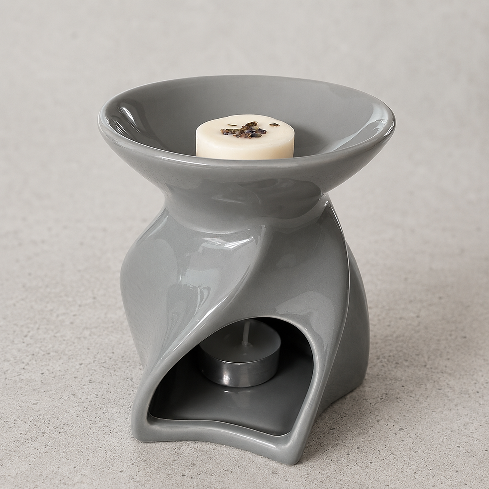 Grey Lyon Wax Burner with a white wax melt on top.