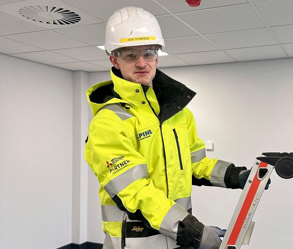 Alpine Air engineer preparing equipment during site work.