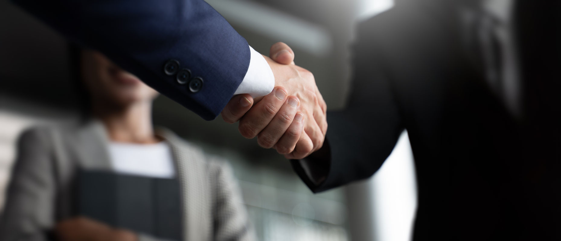 Businessman handshake for teamwork of business merger and acquisition,successful negotiate