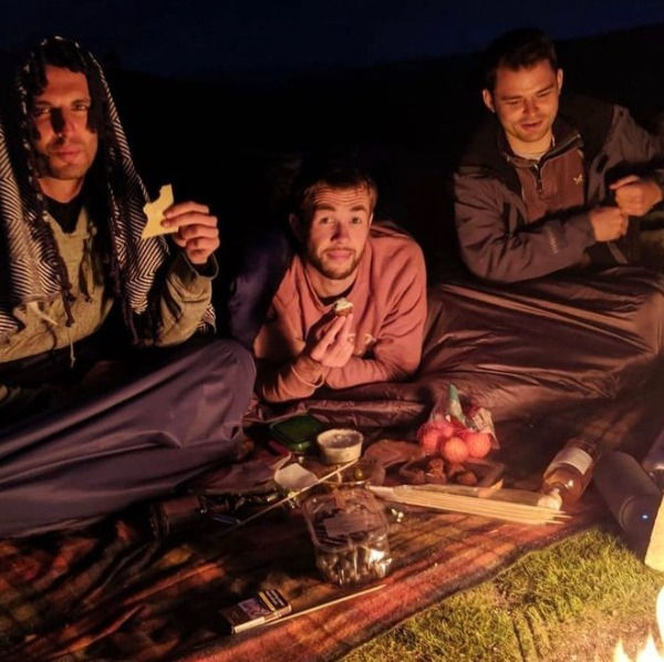 Eating a picnic at night while wild camping