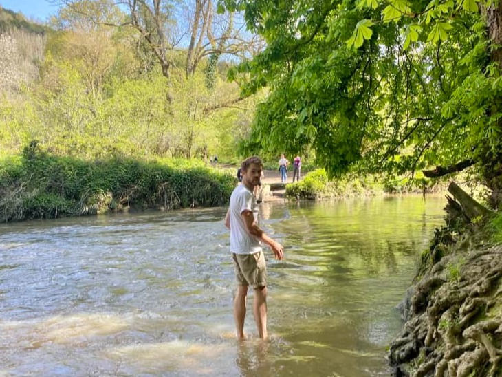 Crossing the river Mole via stepping stones near Box Hill