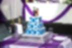 Bride & Groom on blue & white cake