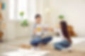 Professional children's psychologist talking to little kid about emotions. Girl chooses ha