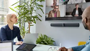 People doing video conferencing in office