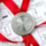 A red seal medal signifying the highest trade certification in Canada