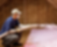 Man blowing insulation into an attic space
