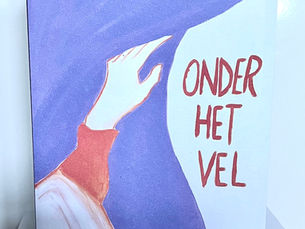 a hand gently brushing away a sheet