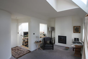 view across living room to stairs