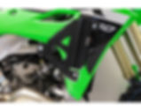 Thumbnail: Black satin Works Connection Radiator Braces with reinforced aluminum design for Kawasaki models.