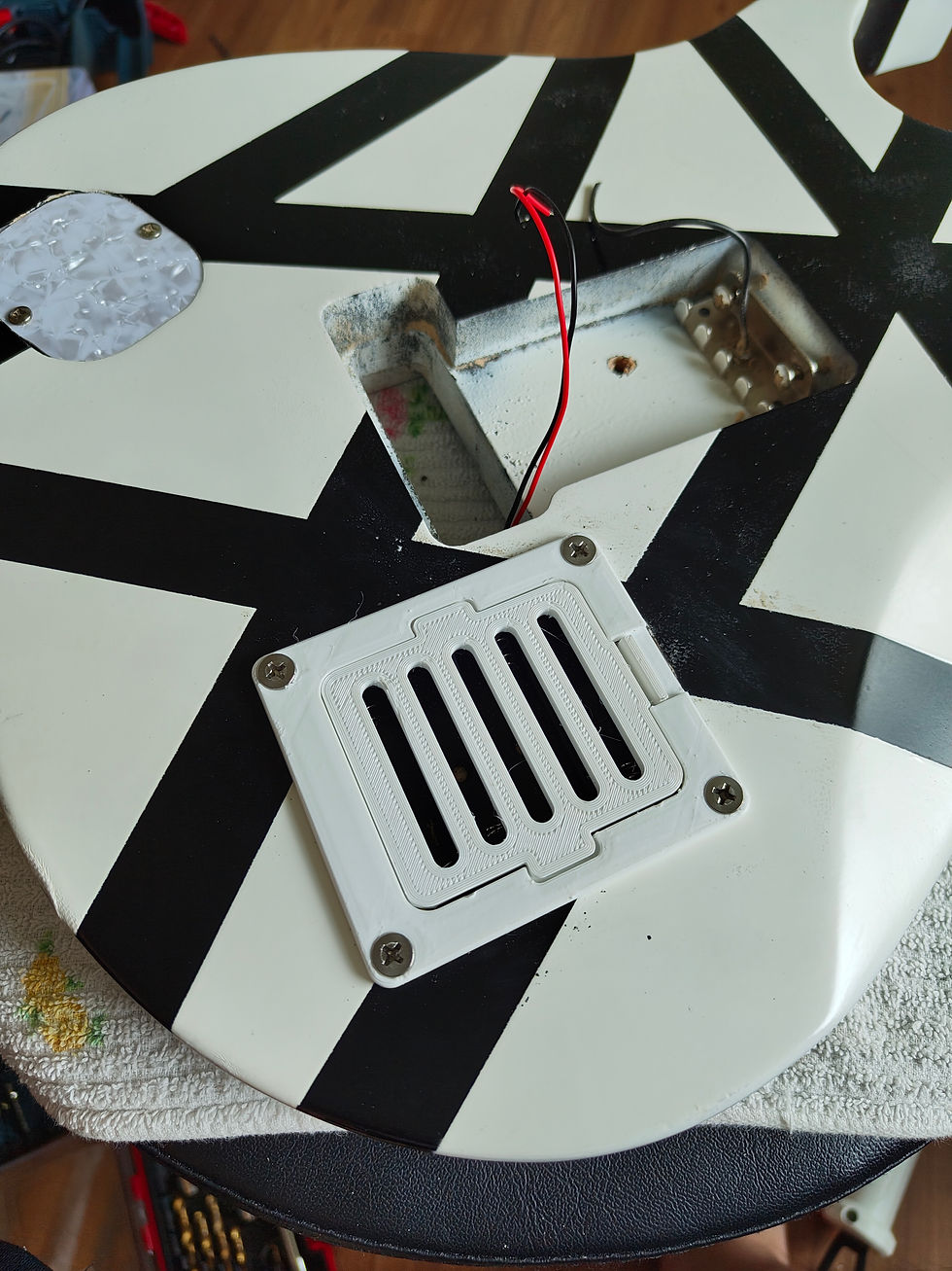 Drill pilot holes and install the cover