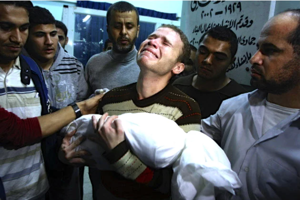 father grieving child's death in Gaza