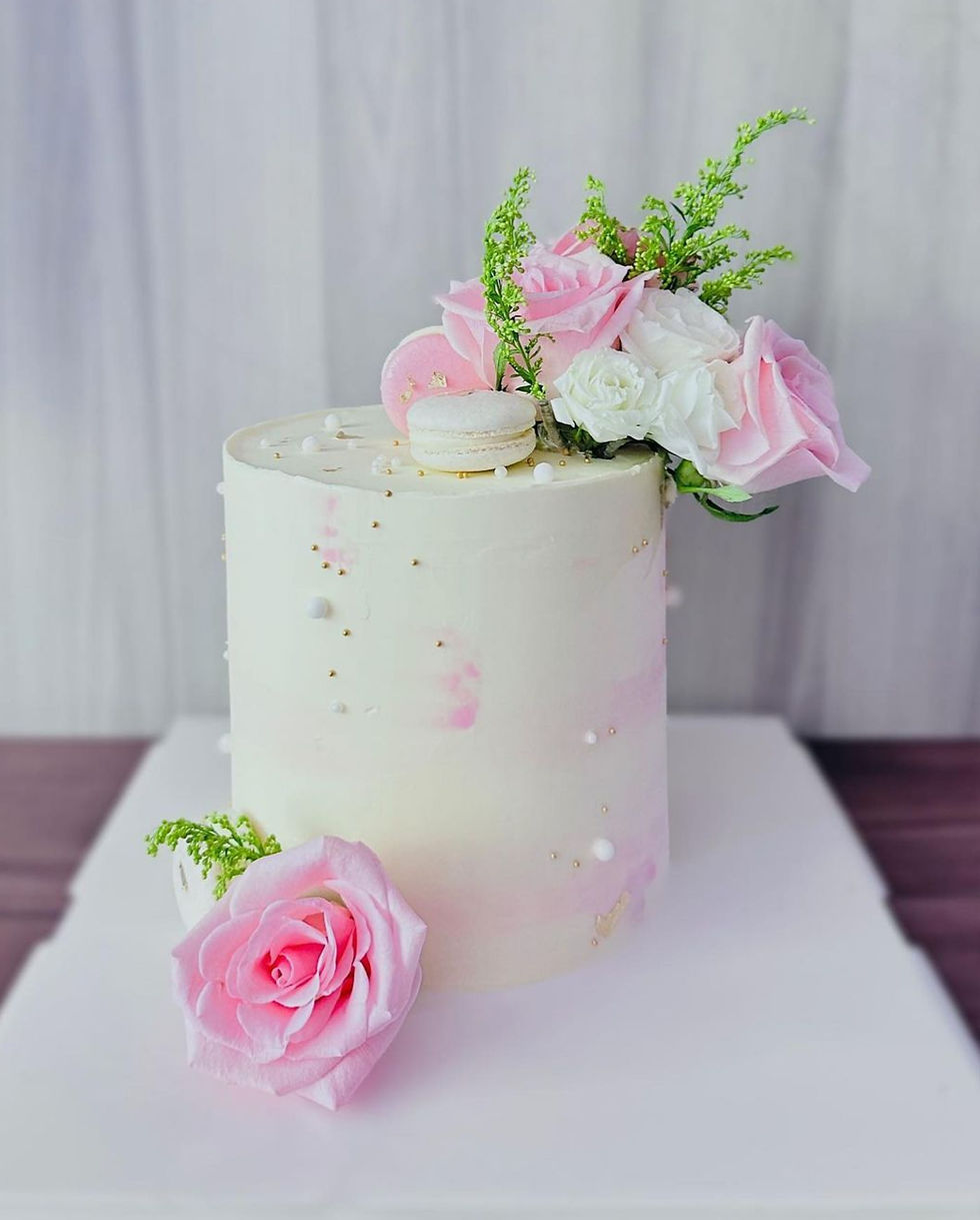 White Cake with Pink Roses
