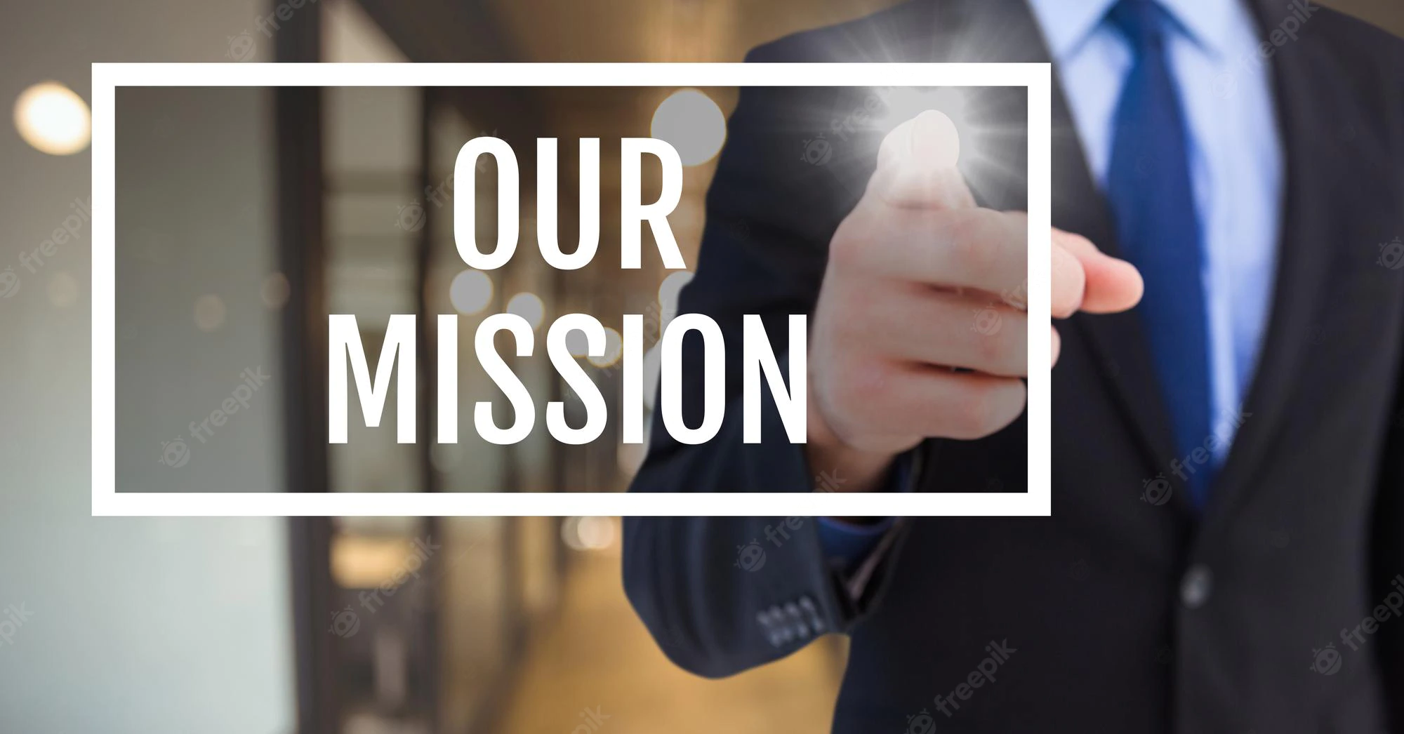 hand-interacting-with-our-mission-business-text-against-blurred-background_1134-14271.webp
