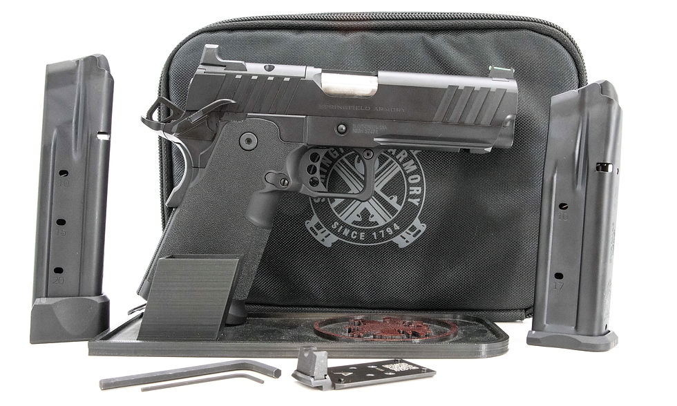 The Springfield Armory DS 1911 Prodigy includes two magazines, an optics plate, wrenches, and a gun wallet.