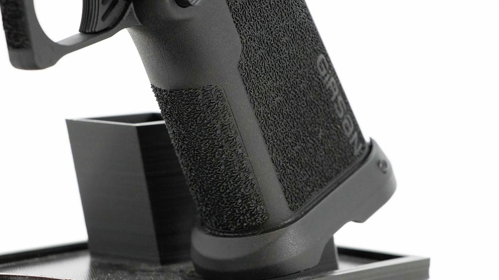 The new grip texture and smaller magazine well of the Witness 2311 CMXX fit the hand nicely without being too much for carry.