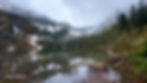 Annette Lake in the early morning mist with mountains in the distance