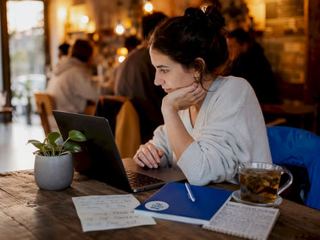 Woman buying tickets online at home