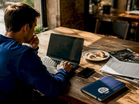 Fan researching sports ticket bundles at home