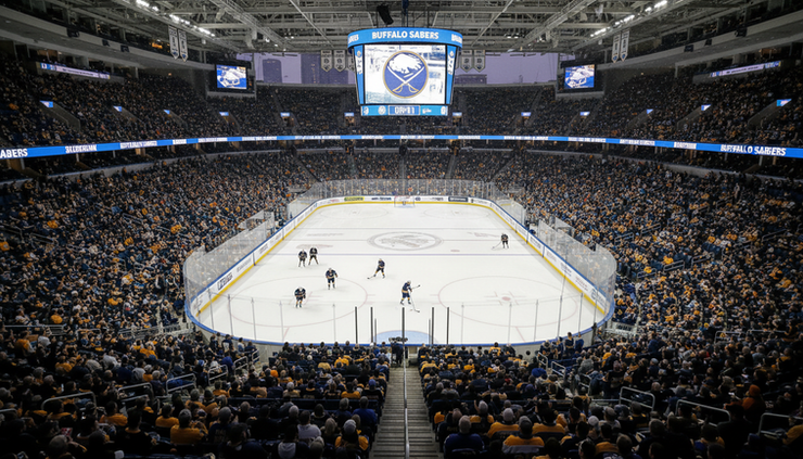 Wide-angle view of a packed Buffalo hockey arena before puck drop