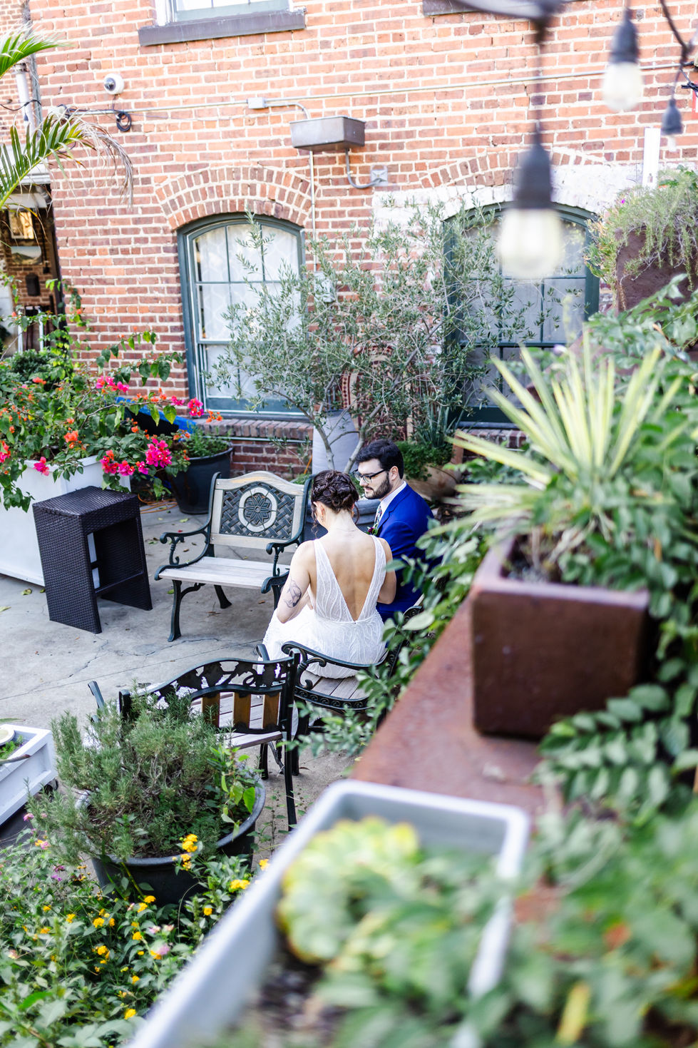 wedding couple exchanging private vows in garden