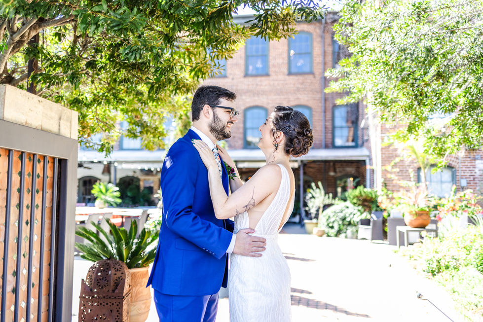 wedding couple having first look in front of wedding venue