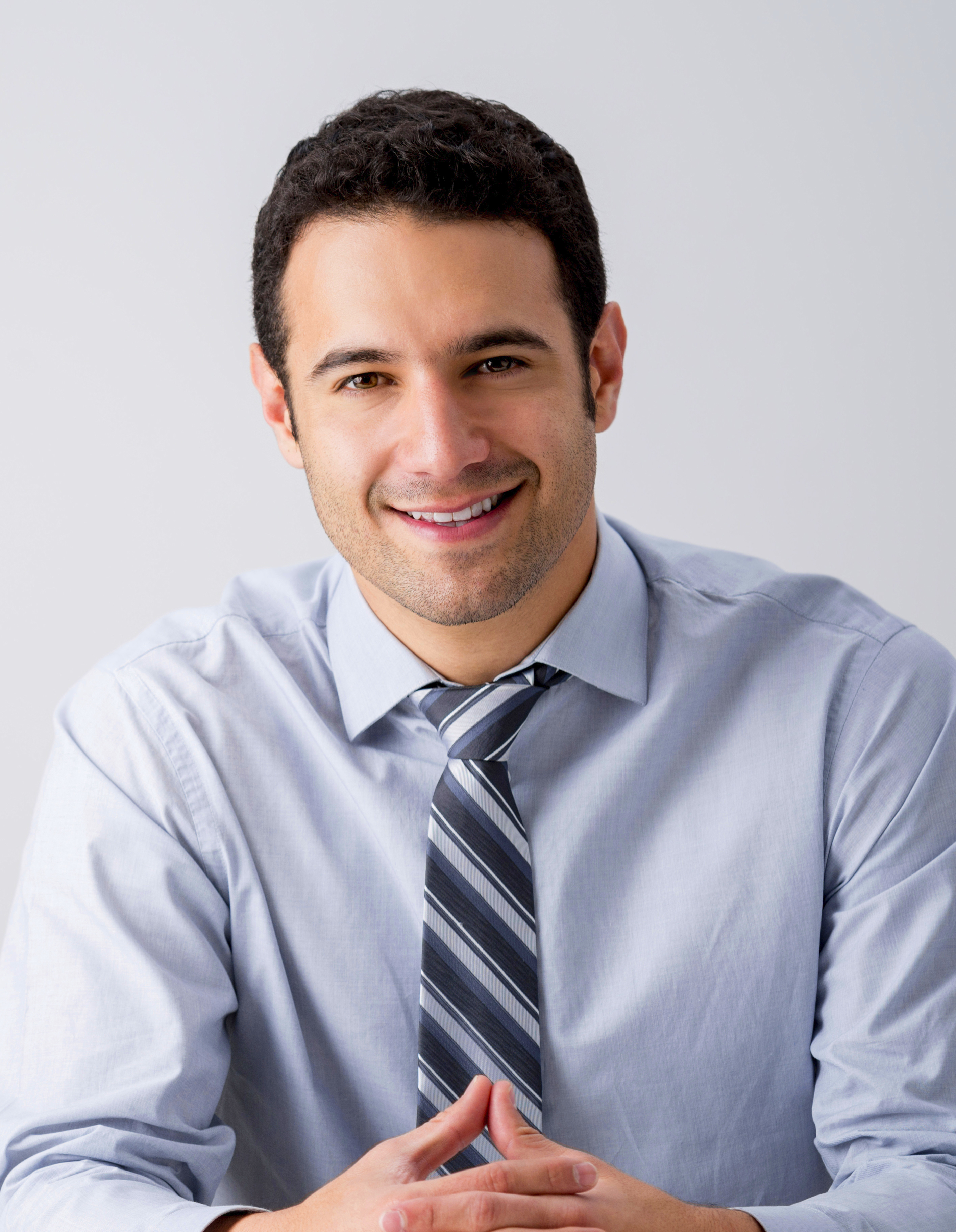 Man Sitting with a Tie