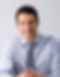 Man Sitting with a Tie a