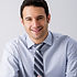 Man Sitting with a Tie