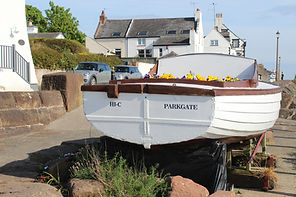 A boat promoting the old fishing industry at Parkgate Book Here ➔