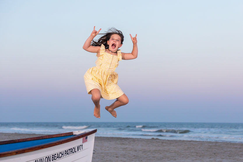 Professional beach photographer for stunning family portraits on the beach during sunset in avalon and stone harbor new jersey.  all major credit cards accepted