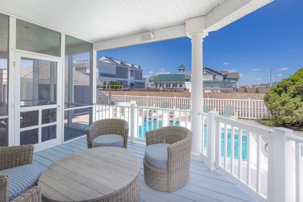 architecture photography of a screened in private pool porch in a luxury home in stone harbor nj