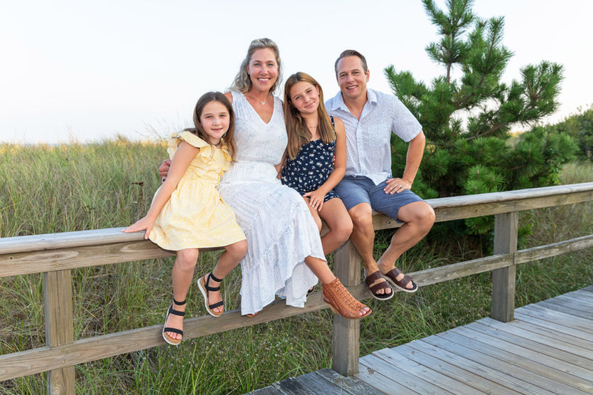 Professional beach photographer for stunning family portraits on the beach during sunset in avalon and stone harbor new jersey. all major credit cards accepted