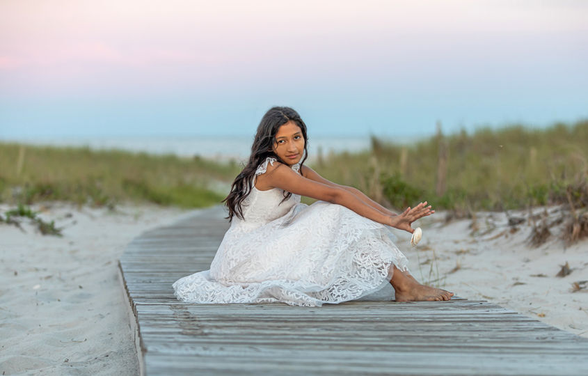 LBI senior portrait photographer with stunning portraits on the beach path with ocean in background