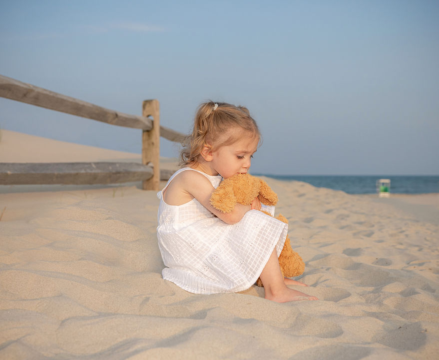 young girl on the beach path in ocean city nj for a beach portrait session