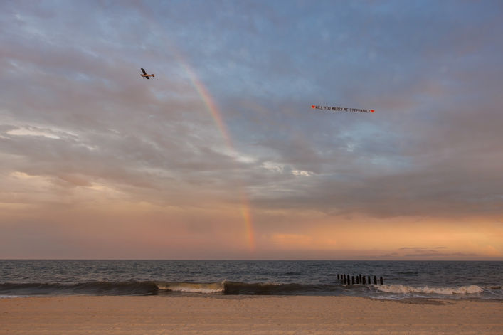 beautiful proposal banner plane for engagement pictures in cape may